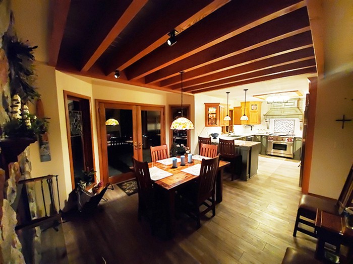 A wood wrap creates a rustic beam look A wood wrap creates a rustic beam look